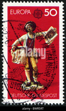 Allemagne- circa 1976 : timbre imprimé en Allemagne, montre Postman, vers 1976 Banque D'Images