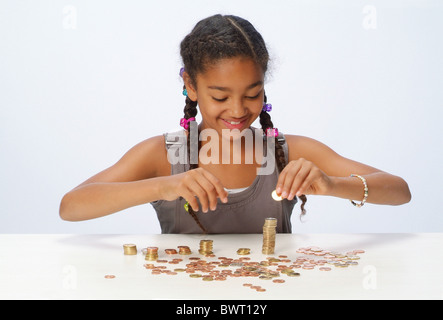 Une fille avec ses économies Banque D'Images