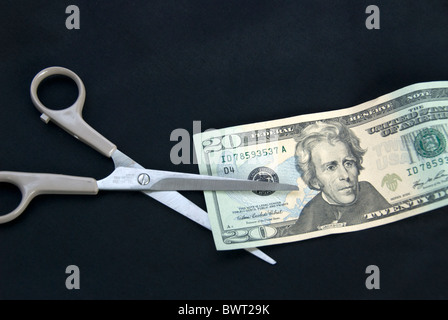 Une coupe ciseaux de vingt dollars. Banque D'Images