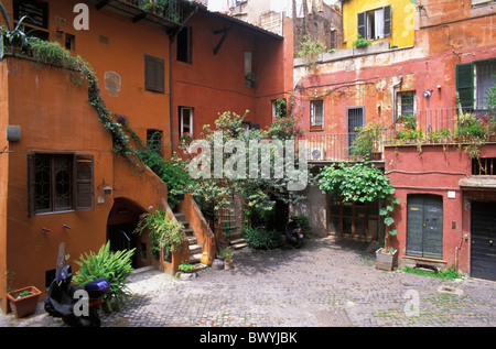 Arco degli acetari façade fleurs maisons maisons Italie Europe idyllique Rome plantes bâtiments résidentiels Banque D'Images