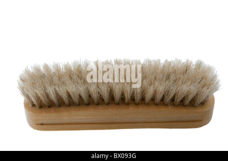 L'image de la brosse à vêtements blancs Banque D'Images