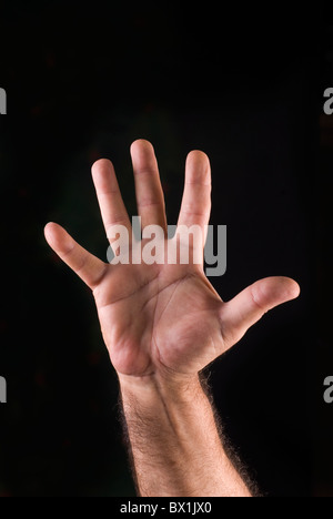 Main de l'homme montrant un geste d'arrêt Banque D'Images