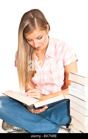 Young adult caucasian woman with books isolated on white Banque D'Images