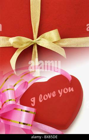 Image composite de rubans décoratifs et symbole en forme de coeur avec "I love you" pour la Saint-Valentin Banque D'Images
