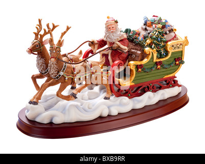 Santa Sleigh Antique isolé sur un fond blanc. Banque D'Images