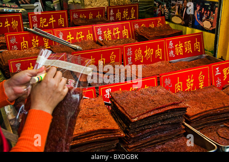 Vente de dalles sur charque séchée street dans le centre-ville de Macao Hong Kong, Chine Banque D'Images