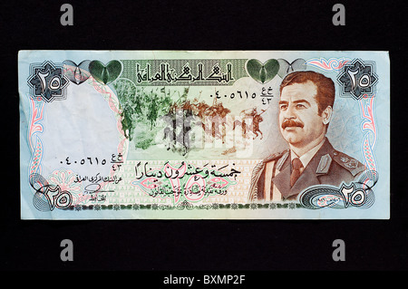 Ancien billet iraquien Saddam Hussein avec effigie Banque D'Images