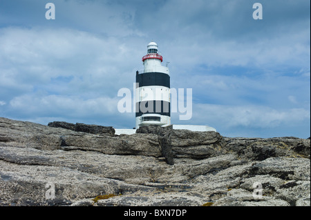 Noir et blanc traditionnel phare à crochet, comté de Wexford, Irlande du Sud Banque D'Images