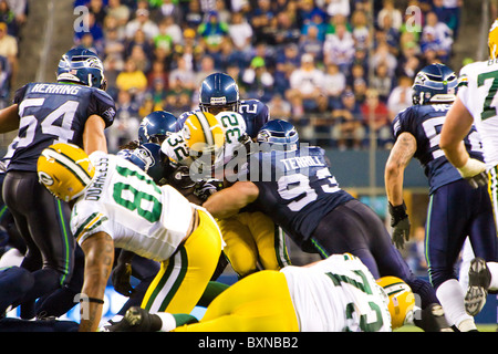 Équipes de la NFL les Seattle Seahawks et les Packers de Green Bay à jouer un match de football Banque D'Images