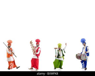 Les hommes sikhs dancing Banque D'Images