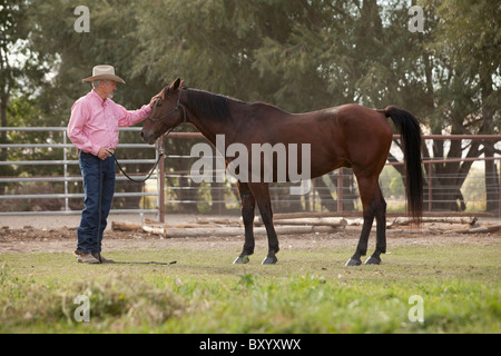 Man horse ranch en Banque D'Images