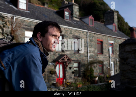 Walker à Barmouth - maisons en bord de mer paysage Banque D'Images