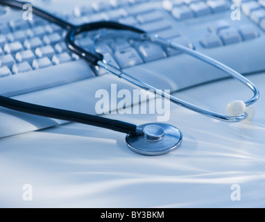 Close-up view of blue globe with stethoscope Banque D'Images