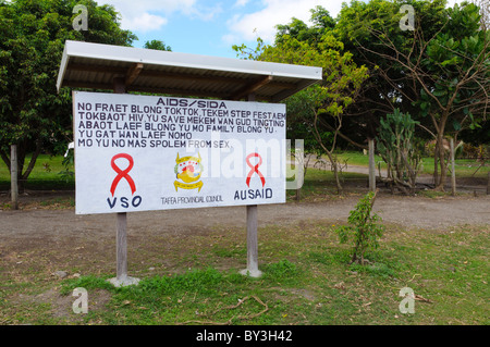 Panneau peint à la main : campagne de santé publique panneau d'avertissement sur le sida et les IST, dans le cadre d'un projet d'aide à l'étranger, en Vanutatu, Pacifique Sud. Bislama le créole. Banque D'Images