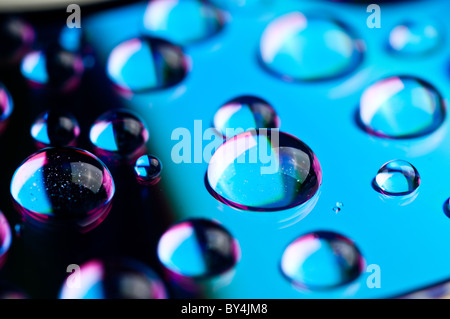 Watter gouttes sur un dvd Banque D'Images