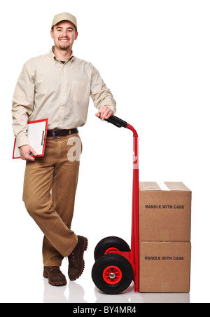 Smiling man with red handtruck isolated on white Banque D'Images