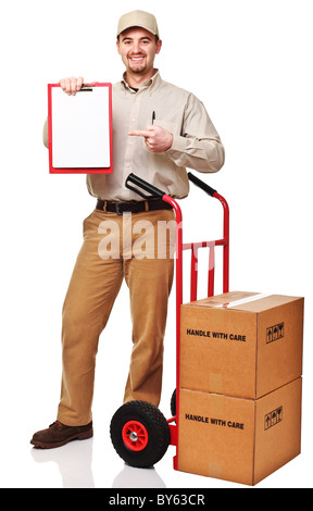 Smiling man with red handtruck isolated on white Banque D'Images