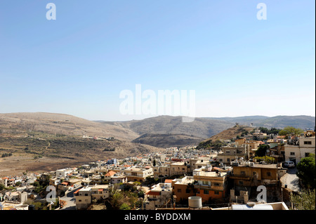 Village druze de Majdal Shams, le milieu gauche 'S"houting" Hill', d'où les gens du côté syrien à voix haute au-dessus de leur Banque D'Images