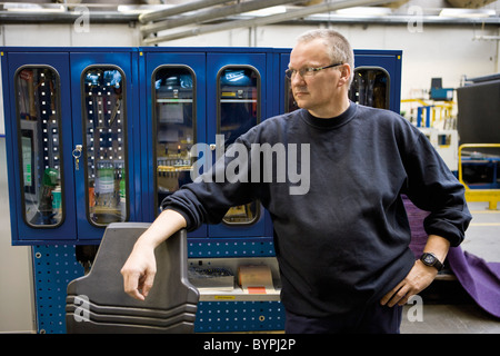 Travailleur du textile en faisant une pause Banque D'Images