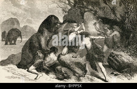 L'homme préhistorique dans le temps de l'ours géant et mammouth. Banque D'Images