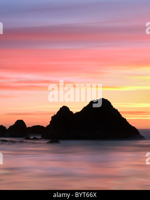 Coucher de soleil à marée basse. Seal Rock, Oregon Banque D'Images