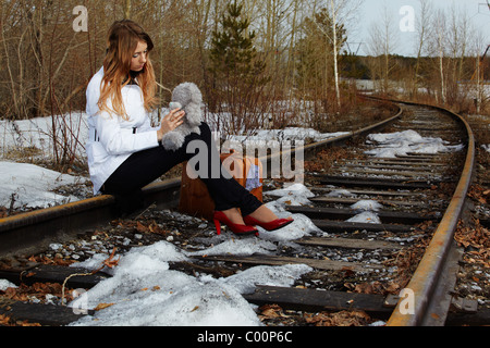 Fille sur rail Banque D'Images