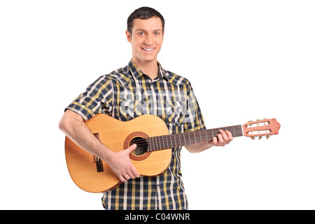 Un homme jouant de la guitare acoustique Banque D'Images
