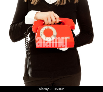 Woman's hands holding old telephone Banque D'Images