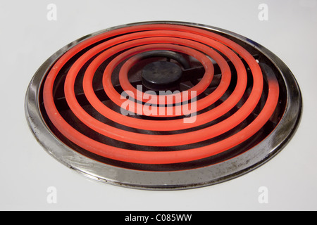 Red Hot brûleur enroulée sur une plaque de cuisson Banque D'Images