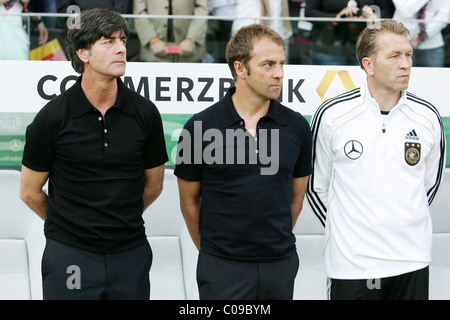 L'entraîneur allemand Joachim Loew' 'Jogi, l'entraîneur adjoint Hansi Flick et entraîneur gardien Andreas Kopke Banque D'Images