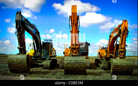 Diggers mécanique sur un grand chantier de construction à Hampton, à Peterborough, Royaume-Uni. Le plus grand développement du logement en Europe. Banque D'Images