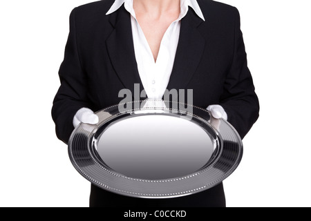 Photo d'une femelle butler holding a silver tray, isolé sur un fond blanc. Bonne image pour un placement de produit. Banque D'Images