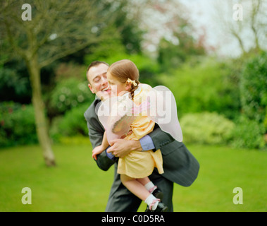 Father daughter wearing fairy wings Banque D'Images