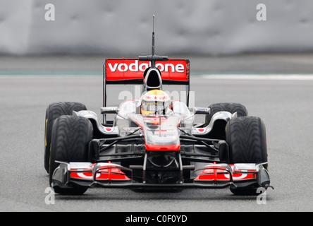 Pilote de Formule 1 britannique Lewis Hamilton dans la McLaren MP4-26 race car en février 2011 Banque D'Images