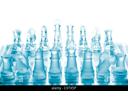 Glass chess on chessboard Banque D'Images