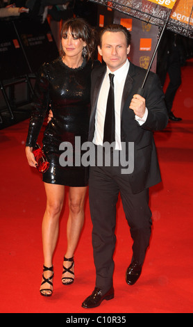 Christian Slater et Tamara Mellon l'Orange British Academy Film Awards (BAFTA) 2009 - l'extérieur des arrivées - Londres, Angleterre Banque D'Images