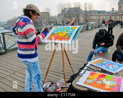 Paris, France, artiste local, peintre, travaillant sur le pont sur la Seine, Pont des Arts, peinture homme, oeuvre urbaine Job Banque D'Images