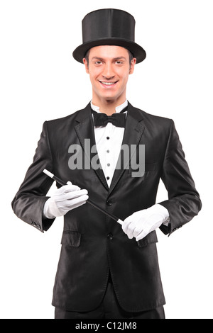 Un magicien avec une baguette magique et posing Banque D'Images