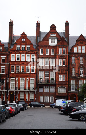 Maisons des riches : maisons de briques rouges au Cadogan Square, Londres, Royaume-Uni. Banque D'Images