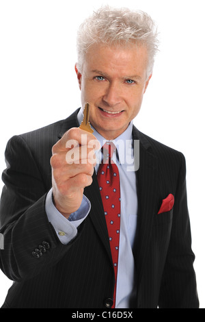 Portrait of businessman holding key isolated over white background Banque D'Images