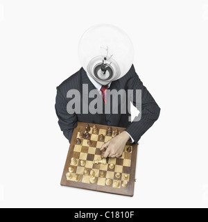 Businessman playing chess Banque D'Images