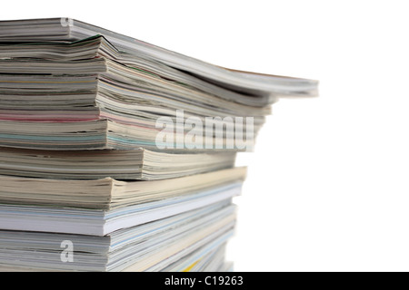 Une pile de magazines utilisé avec copie vide espace vers la droite. Banque D'Images