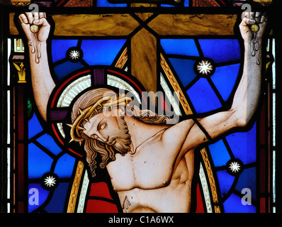 La crucifixion du Christ vitrail, Église Saint Jean-Baptiste, Upper Boddington, Northamptonshire, England, UK Banque D'Images