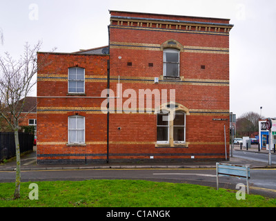 Côté d'un bâtiment en brique, Mill House, dans la région de Albion Street, vu de dit Witcombe, Cheltenham, Gloucestershire, Royaume-Uni Banque D'Images