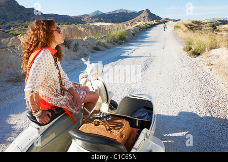 Femme avec ventilés moto Banque D'Images
