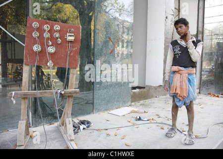 IND, l'Inde, 20110310, l'homme à l'alimentation du site Banque D'Images