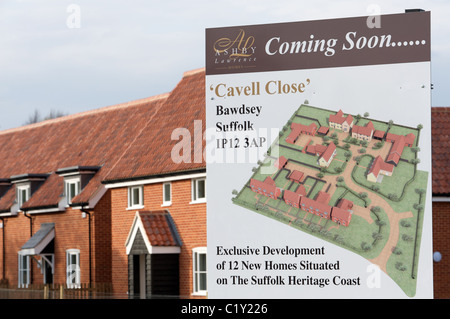 Maisons en construction sur les terres de la ceinture verte, Bawdsey, Suffolk, UK. Banque D'Images