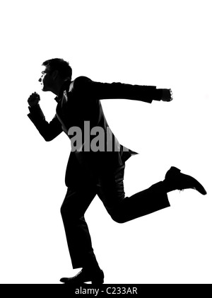 Silhouette caucasian business homme qui court sur toute la longueur du profil studio isolé sur fond blanc Banque D'Images