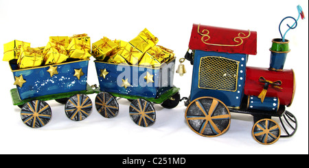 Petit train avec les chariots d'or Banque D'Images