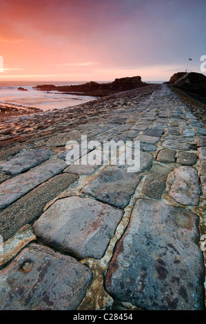 Le brise-lames à Bude Cornwall au coucher du soleil, Mars 2010 Banque D'Images